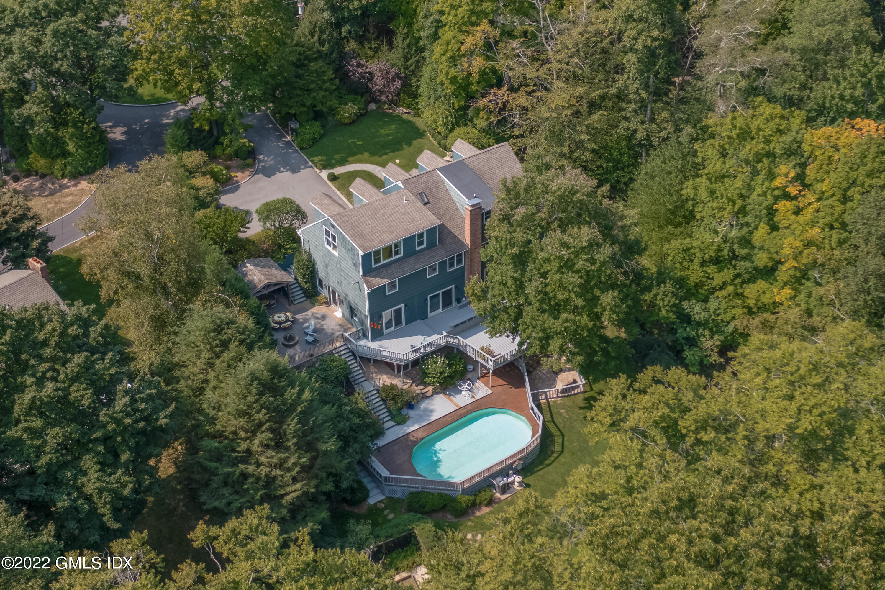 27 Rustic View Road Greenwich, CT 06830 - Photo 34 of 37 an aerial view of a house with yard swimming pool and outdoor seating