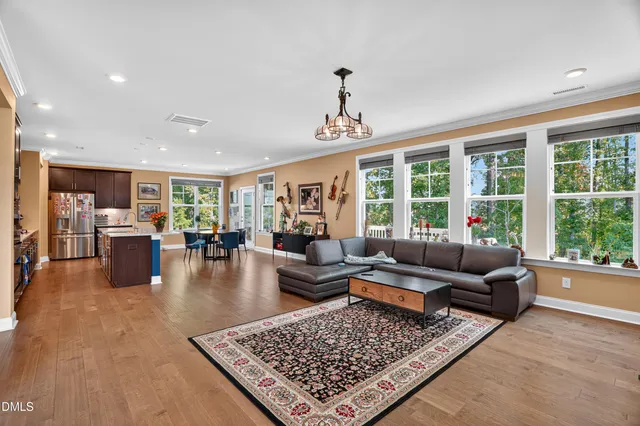 a living room with furniture and a table