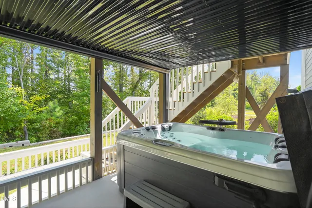 a view of outdoor space with deck and furniture