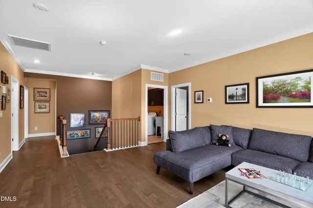 a living room with furniture and window