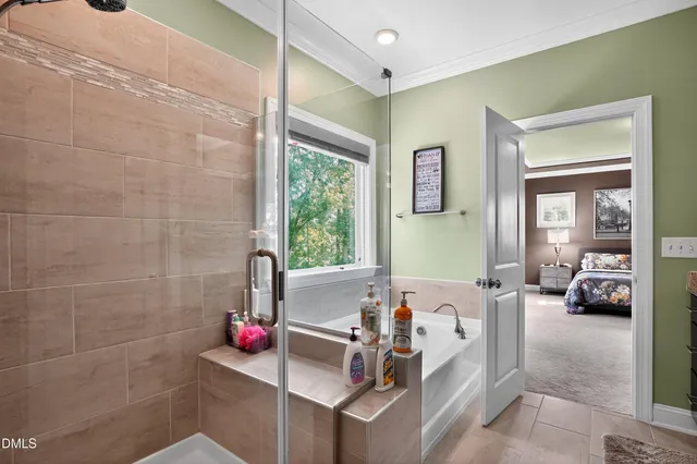 a view of a livingroom with furniture and windows