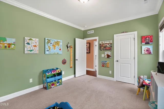 a view of play room with toys and toys