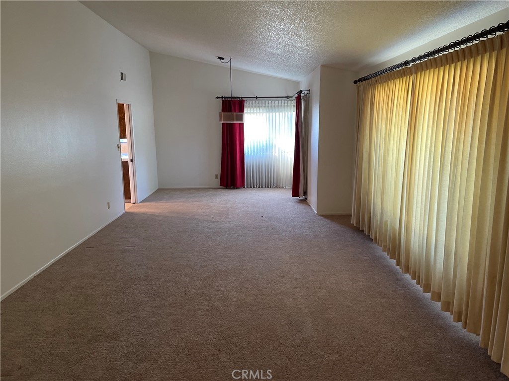 1110 Orange Avenue Monrovia, CA 91016 - Photo 7 of 14 a view of empty room with window and stairs