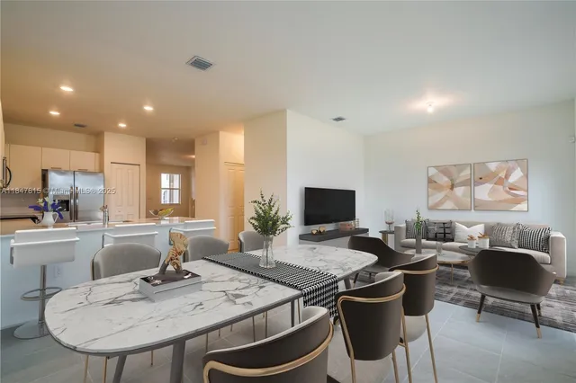 a view of a dining room with furniture