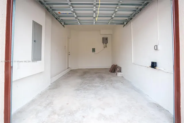 a view of a room with a garage