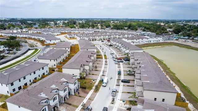 a view of a city with lawn chairs