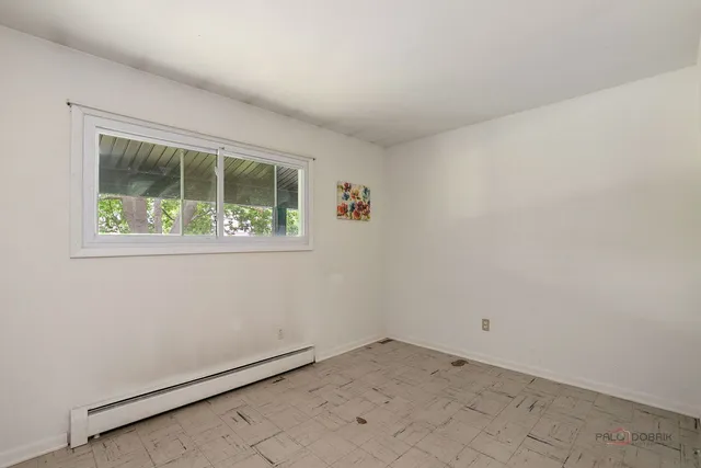 an empty room with a window