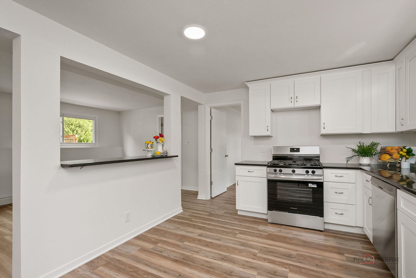 35663 North Helendale Road Ingleside, IL 60041 - Photo 4 of 28 a kitchen with stainless steel appliances granite countertop a stove and a refrigerator