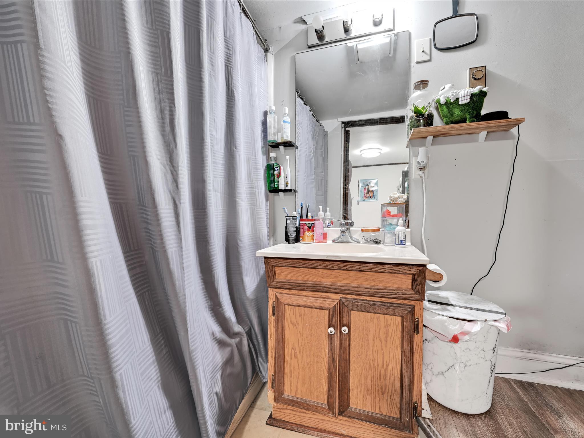103 Mercer Mill Road Landenberg, PA 19350 - Photo 24 of 42 a bathroom with a sink a toilet and mirror