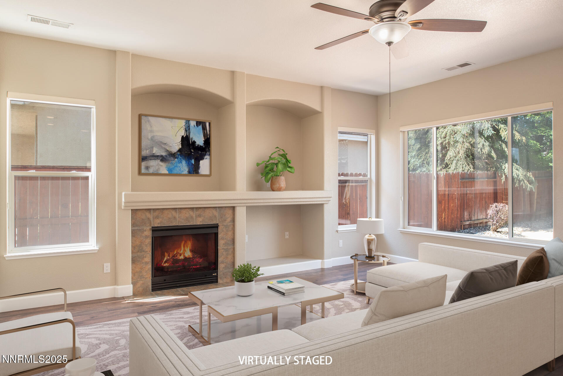 9579 Mammoth Court Reno, NV 89521 - Photo 11 of 39 a living room with furniture and a fireplace