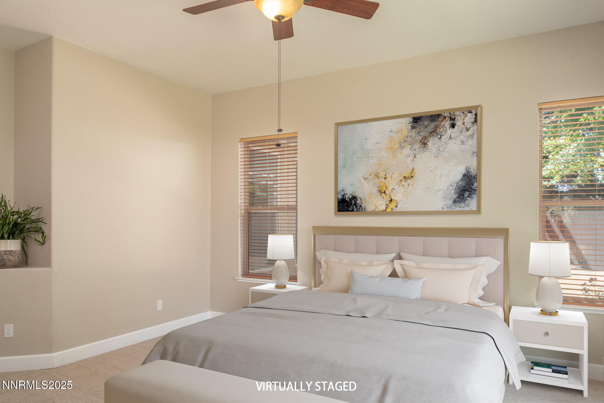 9579 Mammoth Court Reno, NV 89521 - Photo 17 of 39 a bedroom with a bed and a painting on the wall