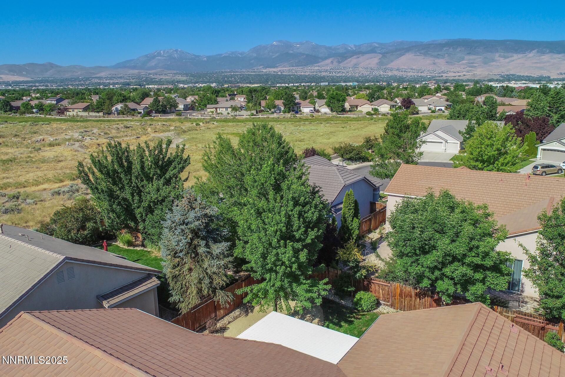 9579 Mammoth Court Reno, NV 89521 - Photo 26 of 39 an aerial view of residential houses with outdoor space and river