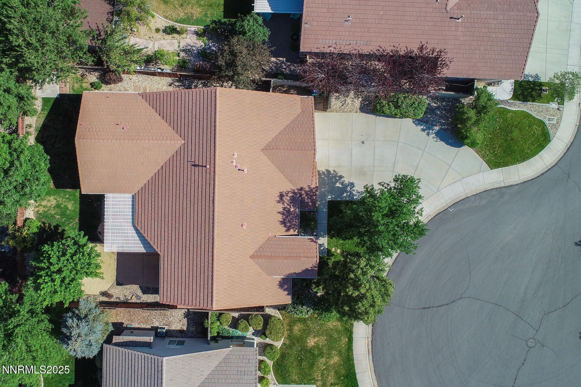 9579 Mammoth Court Reno, NV 89521 - Photo 28 of 39 an aerial view of a house with outdoor space and a lake view