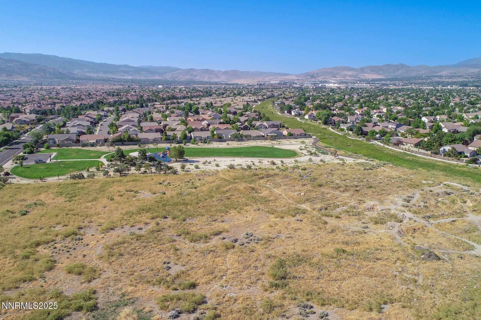 9579 Mammoth Court Reno, NV 89521 - Photo 30 of 39 a view of a city with mountain view in back