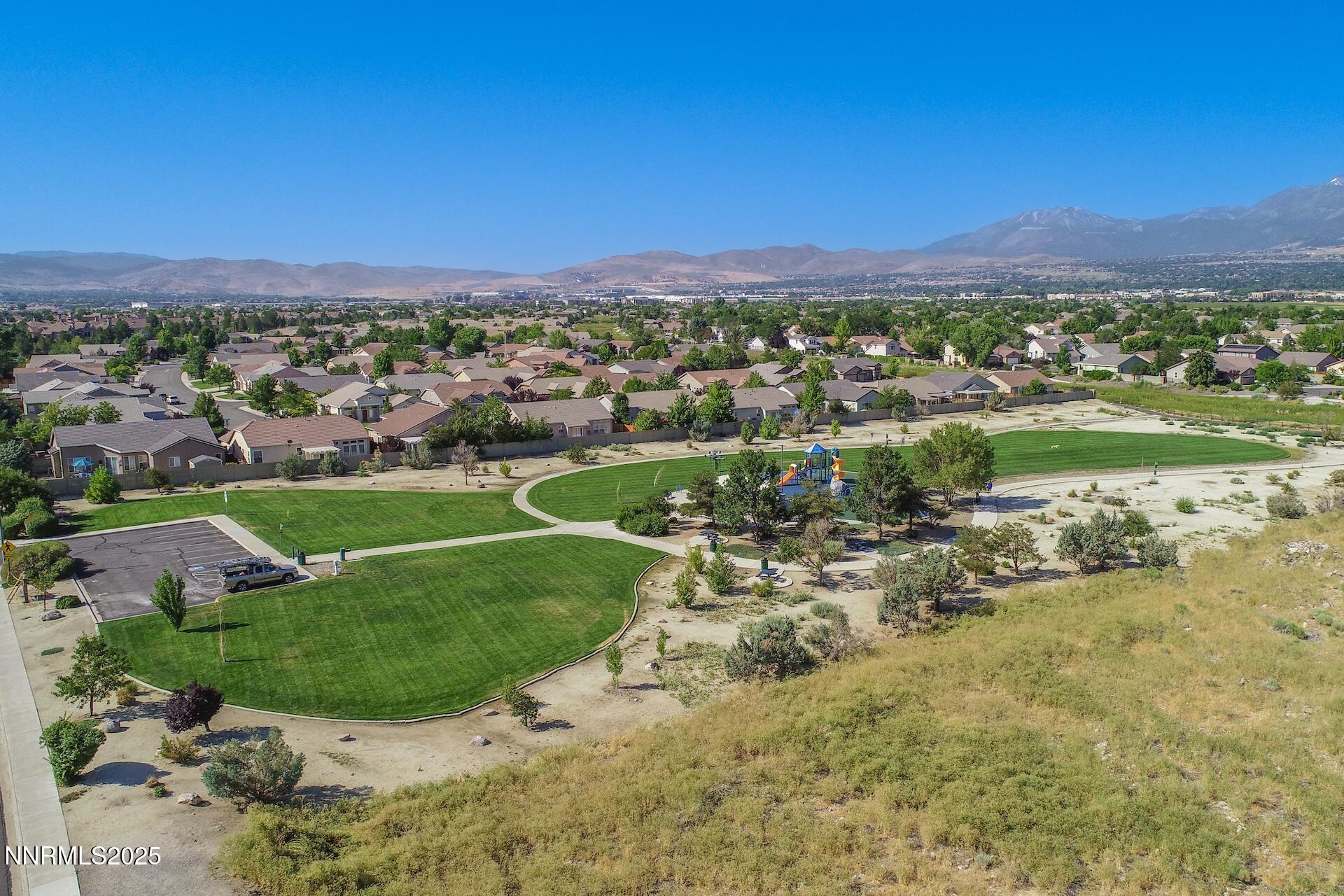 9579 Mammoth Court Reno, NV 89521 - Photo 32 of 39 a view of a lake with a mountain