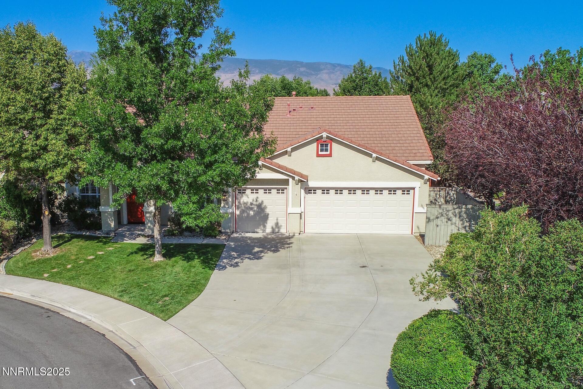 9579 Mammoth Court Reno, NV 89521 - Photo 4 of 39 a view of a house with a yard