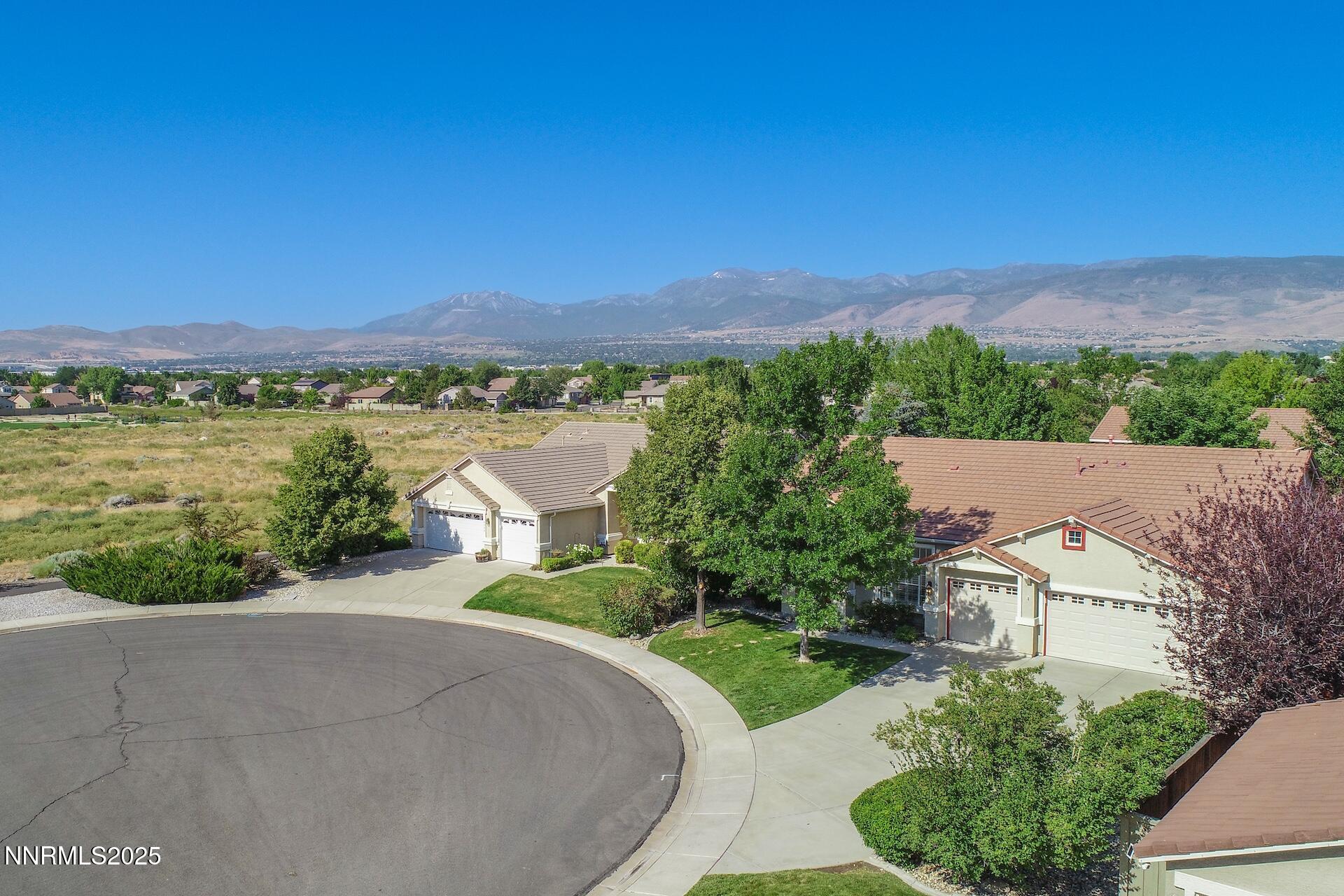 9579 Mammoth Court Reno, NV 89521 - Photo 5 of 39 a view of a city with a building in the background