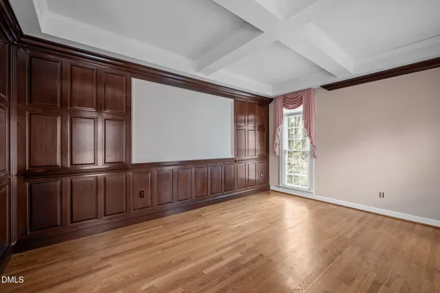 a kitchen with granite countertop a sink and a stove