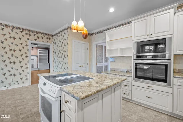 a bathroom with a double vanity sink mirror and double