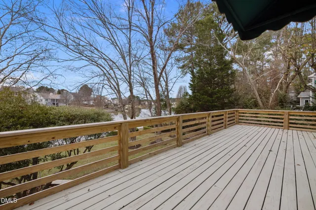 an aerial view of a house with a swimming pool