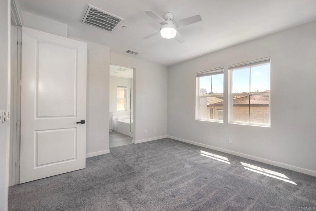 4141 Mission Tree Way Oceanside, CA 92057 - Photo 21 of 35 Primary Bedroom