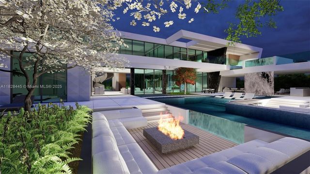 a view of a patio with a table and chairs under an umbrella with a fire pit