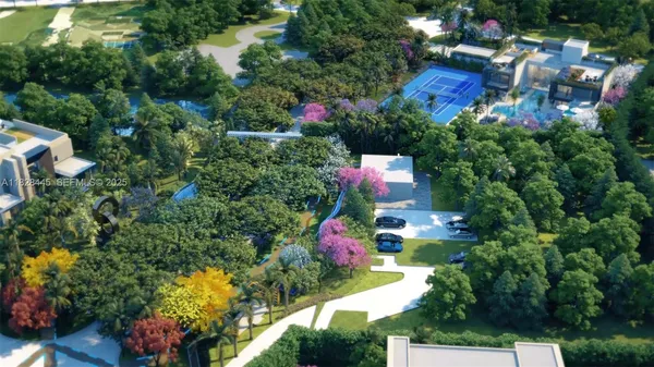 an aerial view of a houses with yard