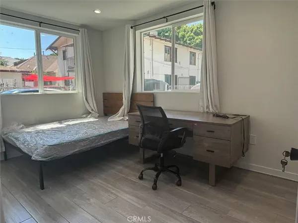 a room with workspace and window