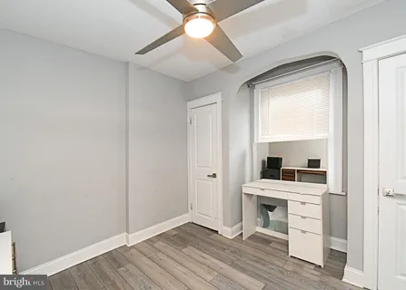 a bathroom with a shower toilet and sink
