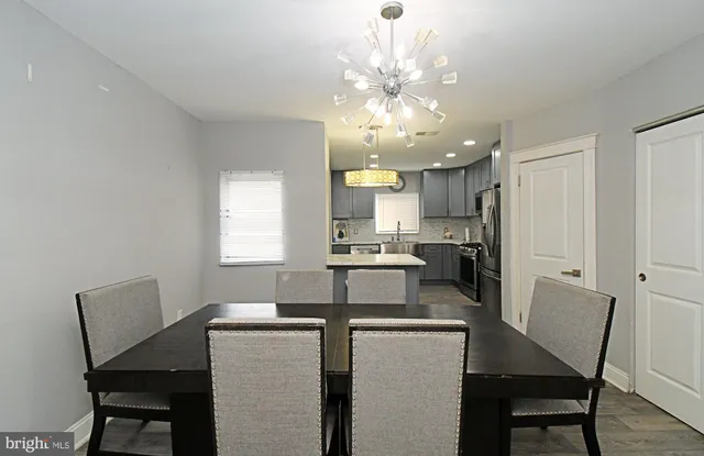 a view of kitchen with cabinets and stainless steel appliances