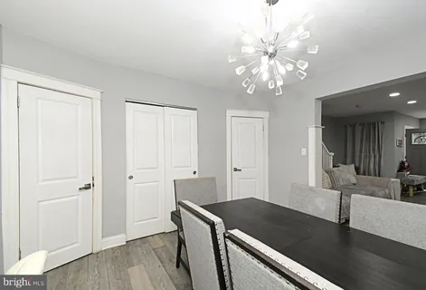 a view of a kitchen from the hallway