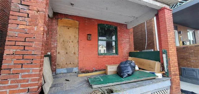 a front view of a house with porch