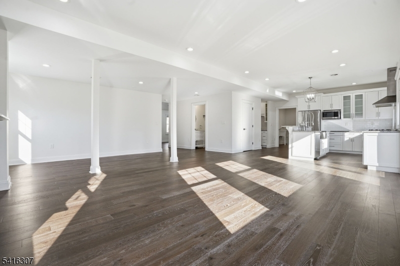44 Manor Road Livingston, NJ 07039 - Photo 13 of 48 a view of a living room and wooden floor