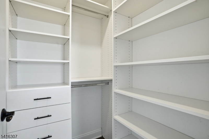 44 Manor Road Livingston, NJ 07039 - Photo 25 of 48 a view of an empty walk in closet