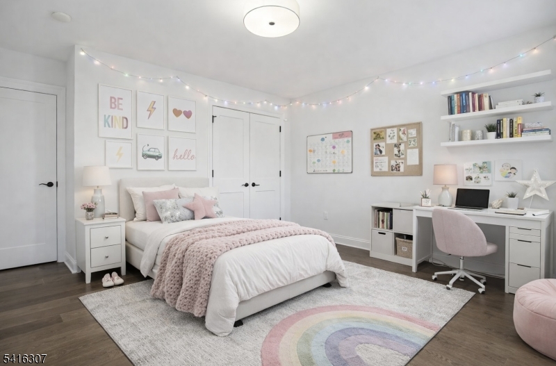 44 Manor Road Livingston, NJ 07039 - Photo 31 of 48 a bedroom with a bed a desk and chair