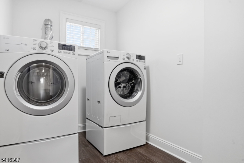 44 Manor Road Livingston, NJ 07039 - Photo 39 of 48 a utility room with dryer and washer