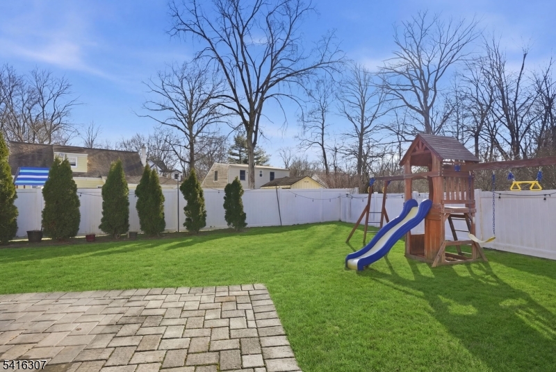 44 Manor Road Livingston, NJ 07039 - Photo 43 of 48 a view of a park with slide