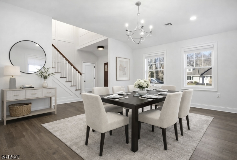 44 Manor Road Livingston, NJ 07039 - Photo 5 of 48 a view of a dining room with furniture and a chandelier