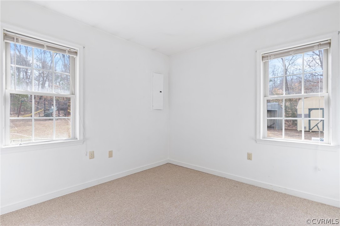 3165 Sandy Hook Road Sandy Hook, VA 23153 - Photo 15 of 25 an empty room with a window
