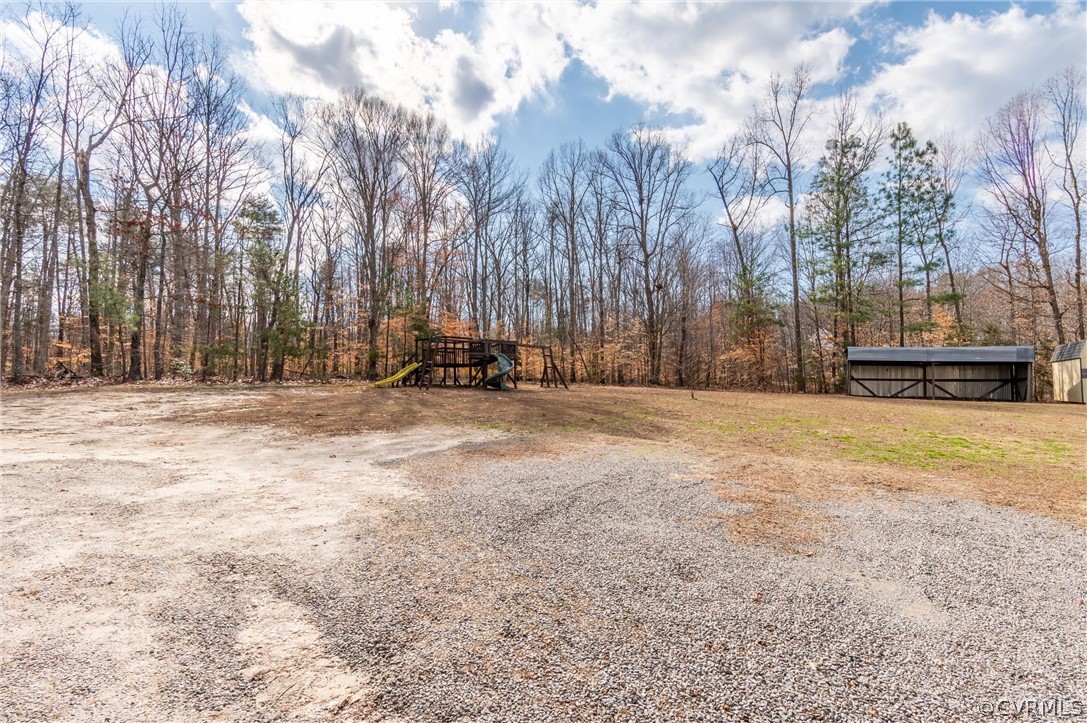 3165 Sandy Hook Road Sandy Hook, VA 23153 - Photo 21 of 25 a view of road with trees