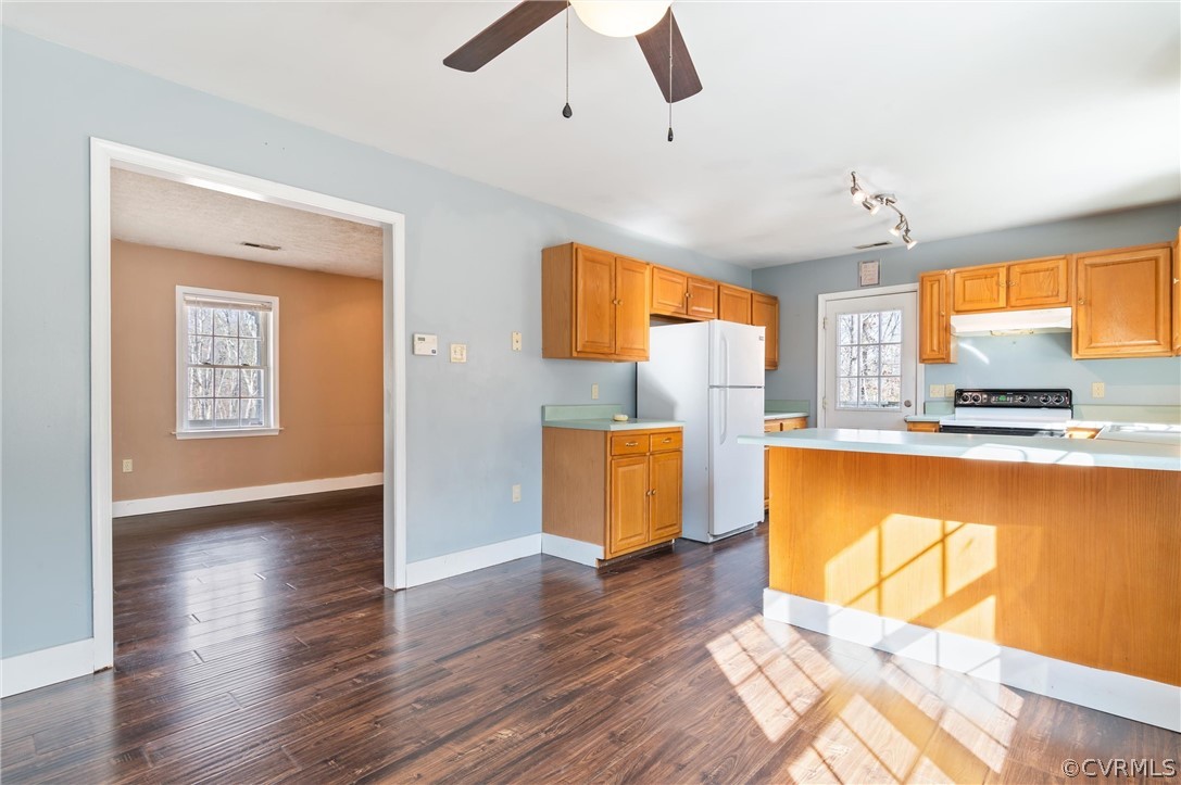 3165 Sandy Hook Road Sandy Hook, VA 23153 - Photo 9 of 25 a view of kitchen with wooden floor and window