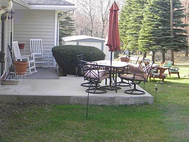 490 Mountain Cir Road Mount Pleasant, PA 15666 - Photo 8 of 20 Exterior Back. Evening entertaining on the patio