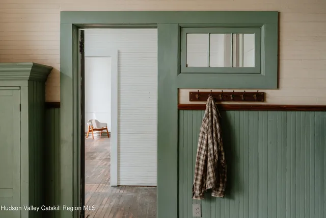 a view of a livingroom with a staircase