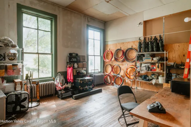 a view of room with furniture