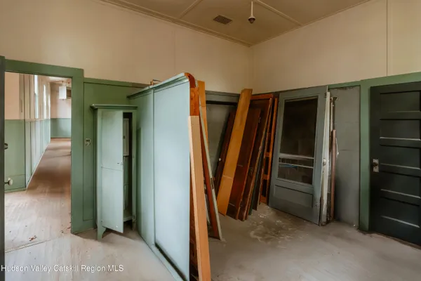 a kitchen with a sink stove and refrigerator