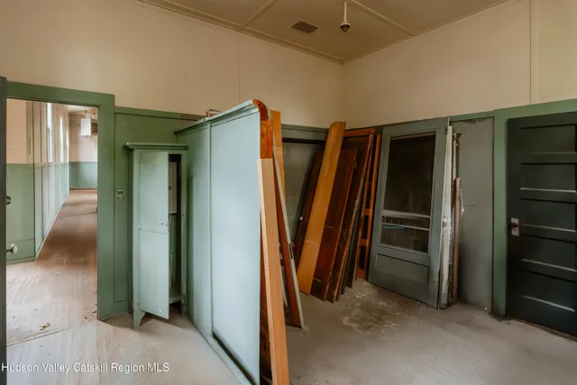 a kitchen with a sink stove and refrigerator