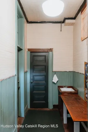 a kitchen with a stove and cabinets