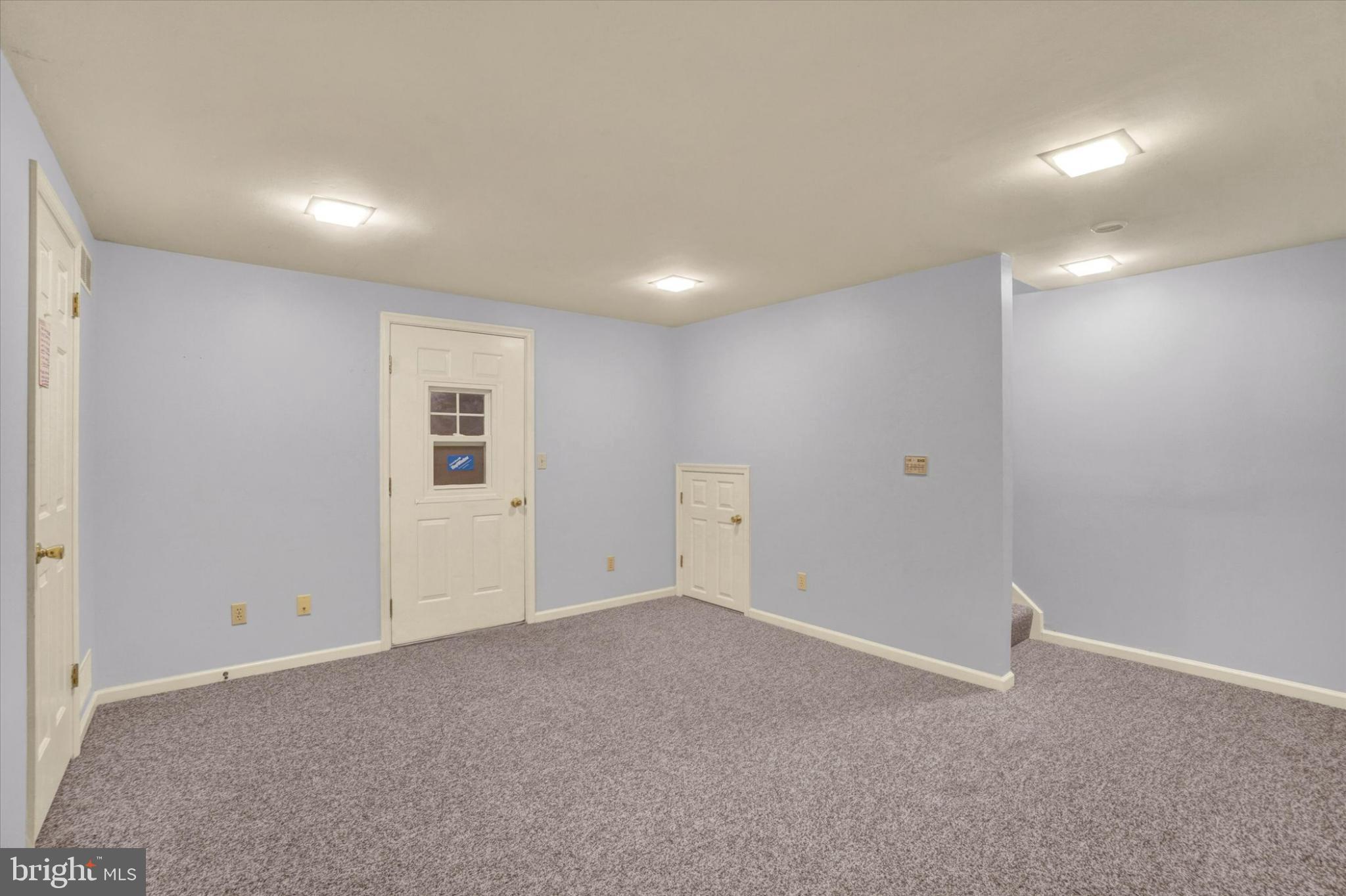 305 Chambers Ridge, Unit 305 York, PA 17402 - Photo 20 of 28 Versatile space with soft blue walls.