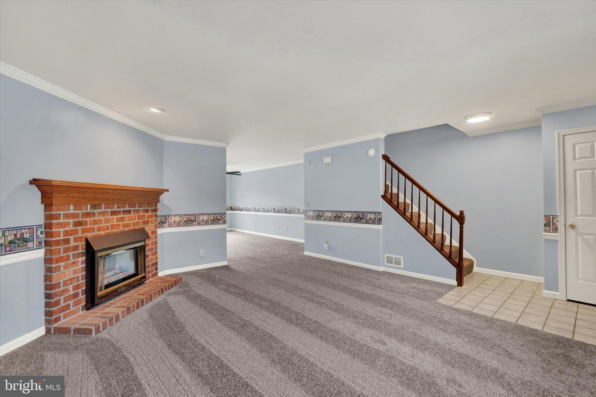 305 Chambers Ridge, Unit 305 York, PA 17402 - Photo 2 of 28 Spacious living area with cozy fireplace.