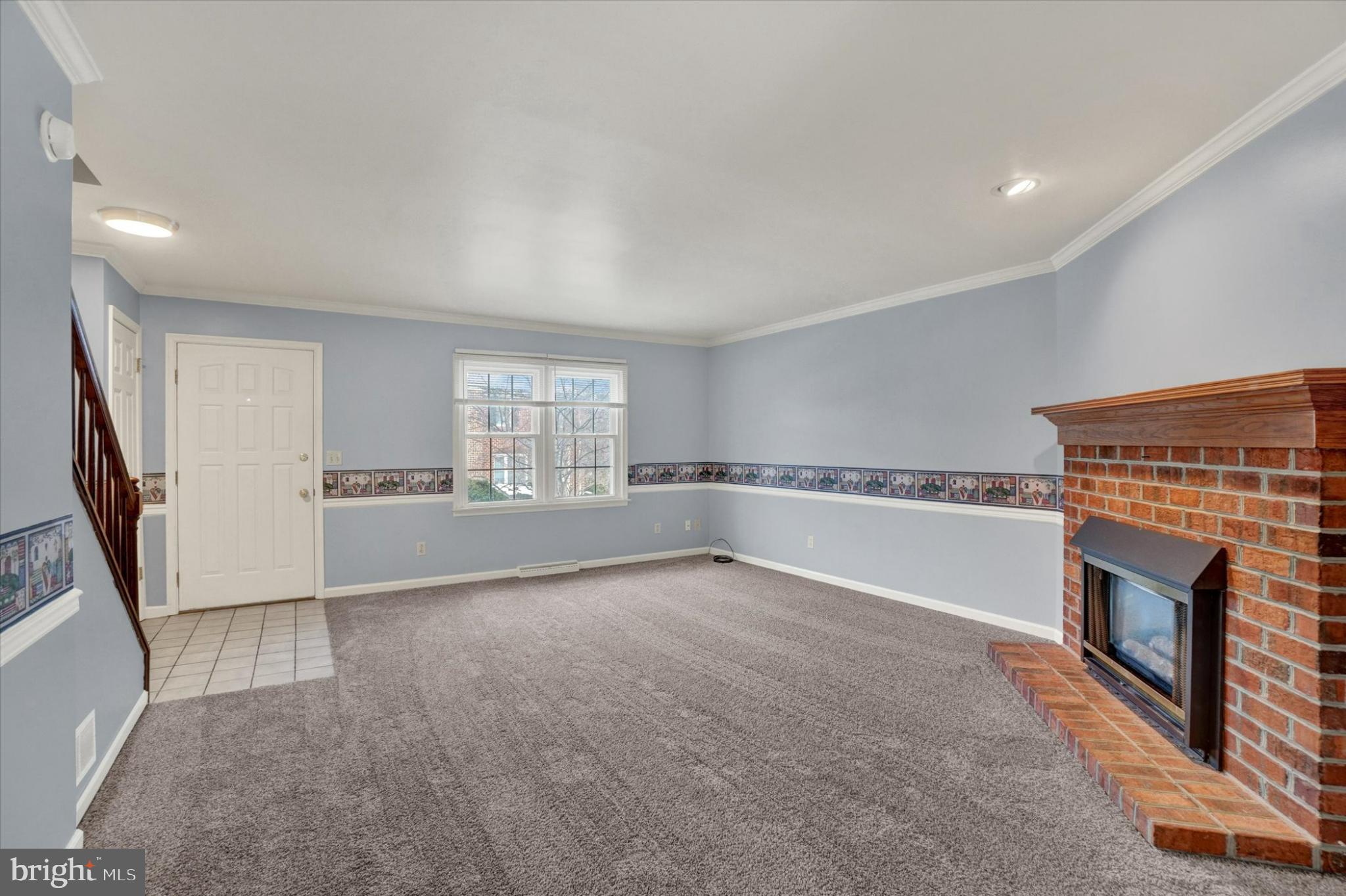 305 Chambers Ridge, Unit 305 York, PA 17402 - Photo 3 of 28 Inviting living space with cozy fireplace.